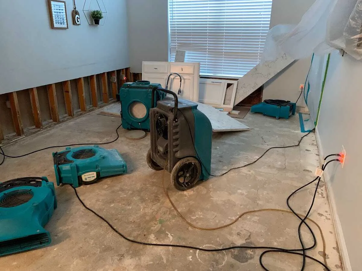 Dehumidifier in flood-cut room for Water Damage Restoration in Bozeman